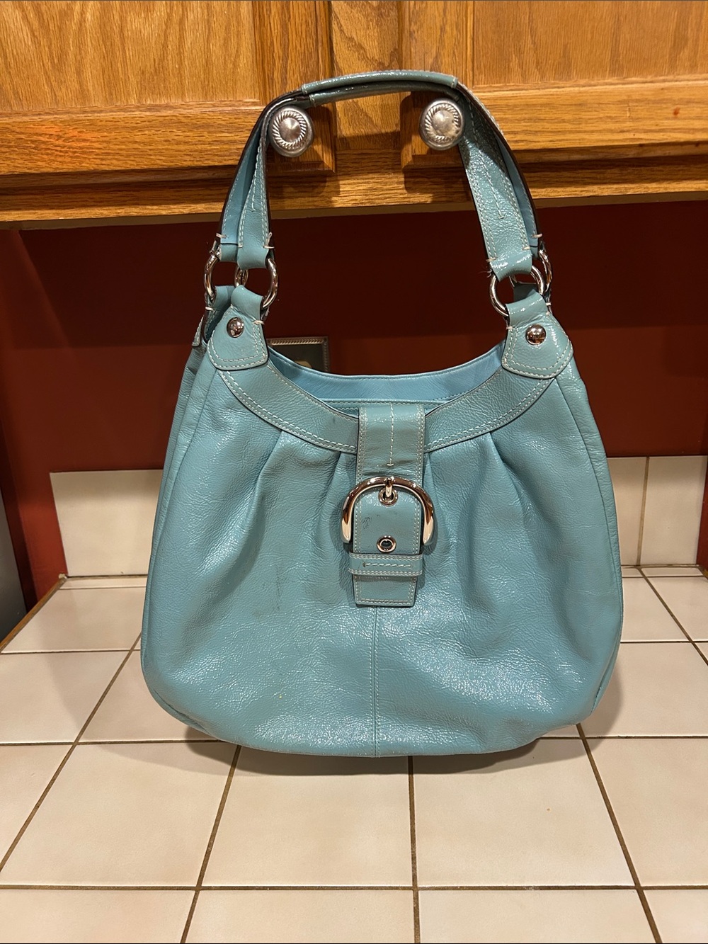 Coach 200’s Light Teal Shoulder Hobo Bag with Buckle Accent